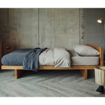 Bevis Oak Wood Bed side view