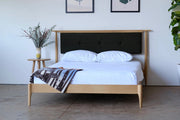 Abby Oak Wood Upholstered Headboard Bed with clean lines and plush design