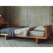 Bevis Oak Wood Bed in room