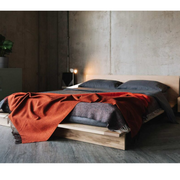 Bexter Oak Wood Bed in bedroom