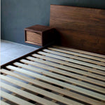 Elese Walnut Wood Bed close-up