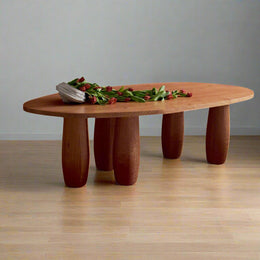 Asymmetric White Dining Table With Oval Legs